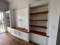 Custom wall unit with oak shelving