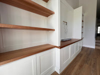 Custom wall unit with oak shelving